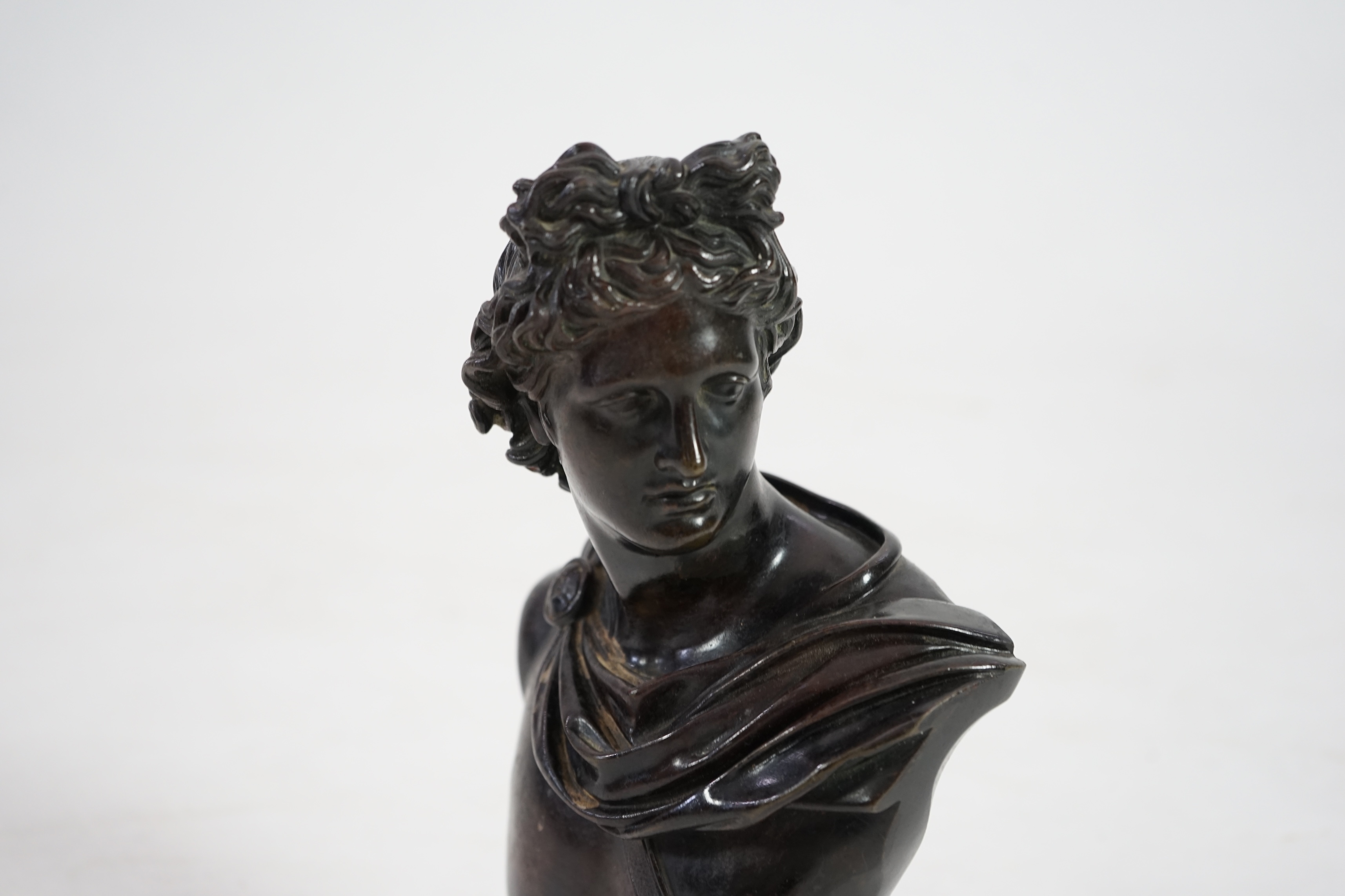 After the antique, a late 19th century Italian bronze bust of Apollo Belvedere